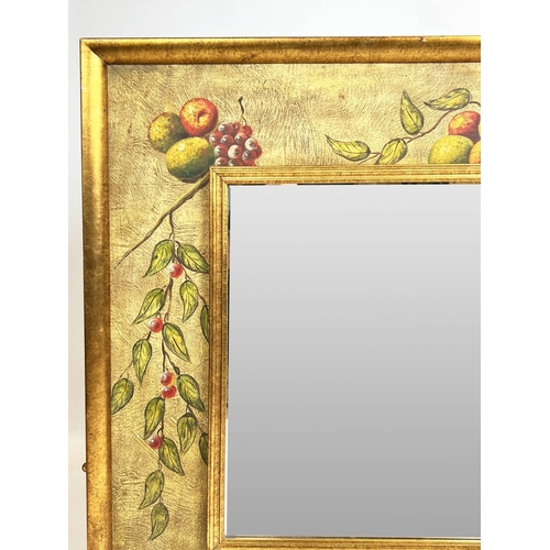 141 - WALL MIRROR, Continental fruit design painted frame with a rectangular bevelled plate, 134cm x 104cm... 