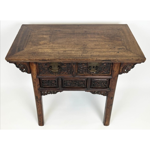 143 - ALTAR TABLE, 19th century Chinese elm, profusely carved front with two frieze drawers, 88cm H x 101c... 