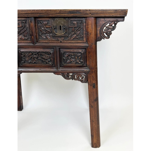 143 - ALTAR TABLE, 19th century Chinese elm, profusely carved front with two frieze drawers, 88cm H x 101c... 