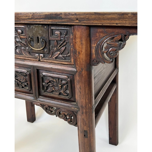 143 - ALTAR TABLE, 19th century Chinese elm, profusely carved front with two frieze drawers, 88cm H x 101c... 