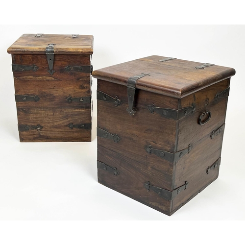 144 - MERCHANT CHESTS, a pair, hardwood and iron bound with rising tops, 57cm H x 46cm x 46cm. (2)