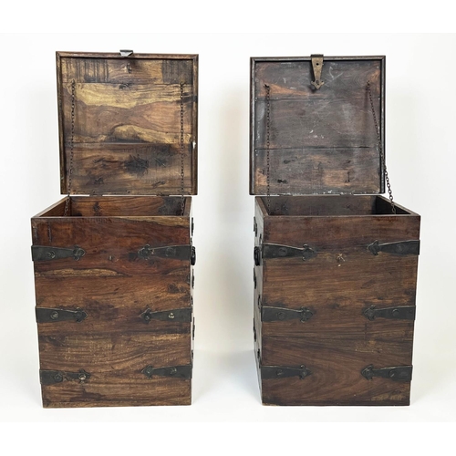 144 - MERCHANT CHESTS, a pair, hardwood and iron bound with rising tops, 57cm H x 46cm x 46cm. (2)