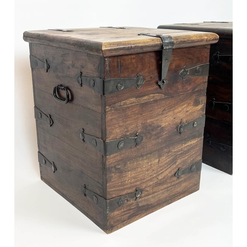 144 - MERCHANT CHESTS, a pair, hardwood and iron bound with rising tops, 57cm H x 46cm x 46cm. (2)