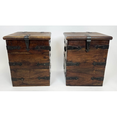 144 - MERCHANT CHESTS, a pair, hardwood and iron bound with rising tops, 57cm H x 46cm x 46cm. (2)