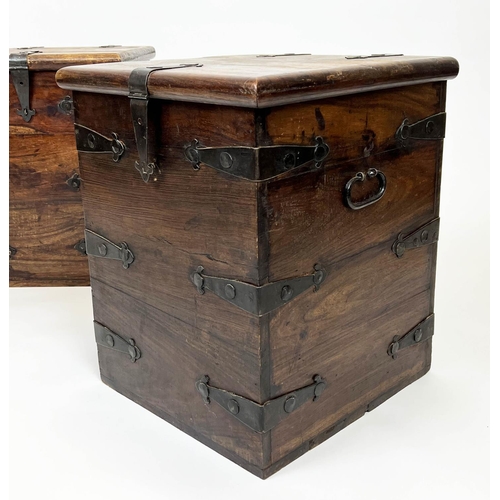 144 - MERCHANT CHESTS, a pair, hardwood and iron bound with rising tops, 57cm H x 46cm x 46cm. (2)