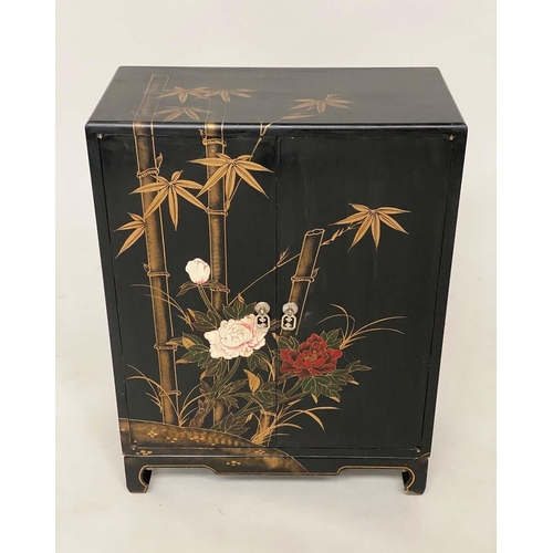 165 - CHINESE SIDE CABINET, black lacquered and gilt Chinoiserie and bamboo palm decorated with two doors,... 