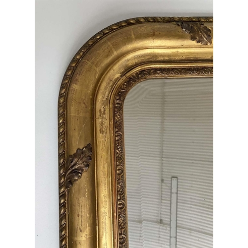 169 - OVERMANTEL, 19th century French giltwood and gesso moulded, arched rectangular, bevelled mirror, lea... 