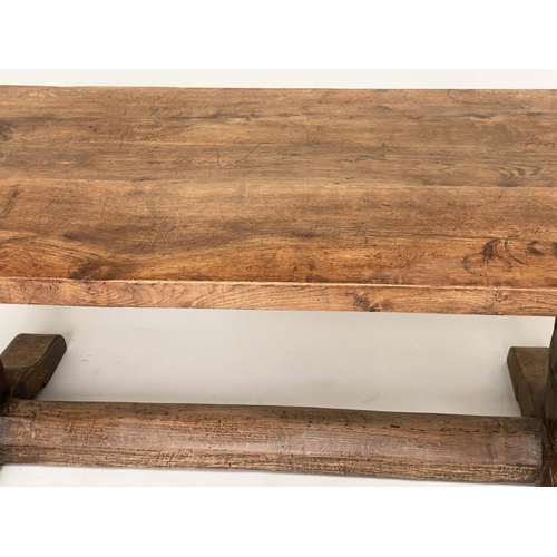 179 - REFECTORY TABLE, antique English oak rectangular cleated on substantial carved trestle and stretcher... 