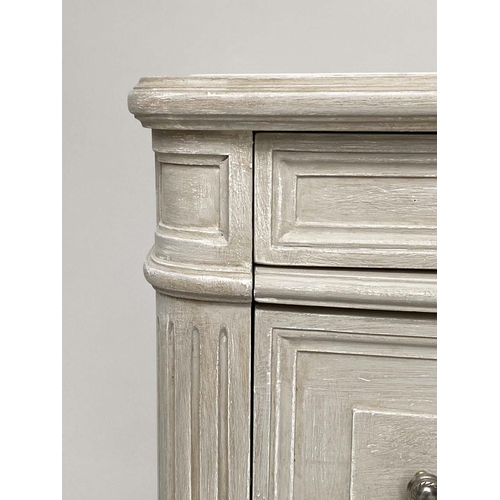 183 - BEDSIDE CHESTS, a pair, French Louis XVI style grey painted and silvered metal mounted each with thr... 