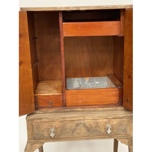 185 - COCKTAIL CABINET, early 20th century Queen Anne style walnut and silvered metal mounted with two pan... 