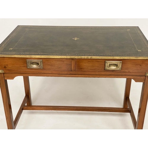 189 - WRITING TABLE, 1970's Campaign style yewwood and brass bound with gilt tooled green leather and two ... 