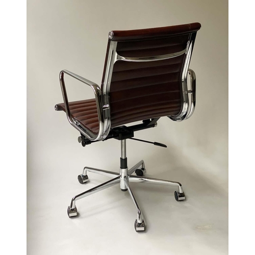 190 - REVOLVING DESK CHAIR, Charles and Ray Eames inspired ribbed mid brown leather seat revolving and rec... 