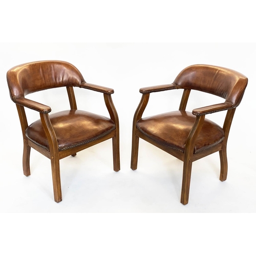 232 - LIBRARY ARMCHAIRS, a pair, walnut and studded mid tan leather each with curved back, 62cm W. (2)