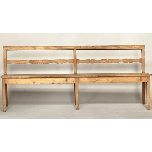 247 - HALL BENCH, 19th century French provincial pine with raised bar back and swept front supports, 214cm... 