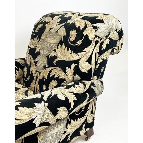 267 - HOWARD STYLE ARMCHAIR, upholstered in Versace style fabric with turned front supports and castors, 8... 