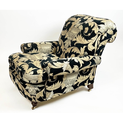 267 - HOWARD STYLE ARMCHAIR, upholstered in Versace style fabric with turned front supports and castors, 8... 