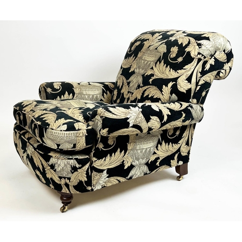 267 - HOWARD STYLE ARMCHAIR, upholstered in Versace style fabric with turned front supports and castors, 8... 