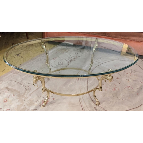 328 - MAISON JANSEN STYLE COCKTAIL TABLE, rams head detail, gilt metal and glass, 126cm x 71cm x 51cm.