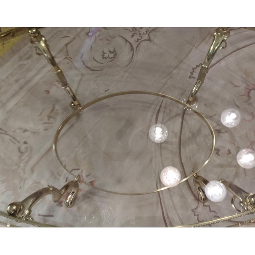 328 - MAISON JANSEN STYLE COCKTAIL TABLE, rams head detail, gilt metal and glass, 126cm x 71cm x 51cm.