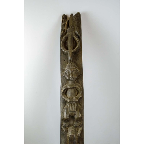 4 - AFRICAN DOOR LINTEL, with repeat figural carving, 185cm H.