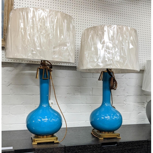 425 - PAOLO MOSCHINO ADESSA TABLE LAMPS, a pair, with shades but different shade carriers, 81cm H. (2)