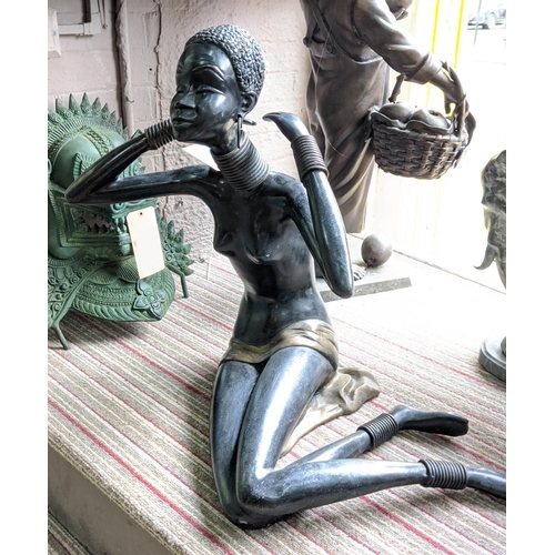 457 - RECUMBENT AFRICAN LADY, perdu cast bronze, 62cm H.