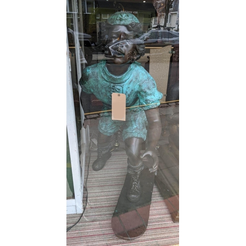 477 - BOY SKATEBOARDING, perdu cast bronze, with verdigris detail, 125cm H.