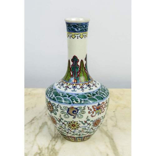 18 - A CHINESE FAMILLE VERTE BOTTLE VASE, Qianlong style, with foliate decoration, 26cm H.