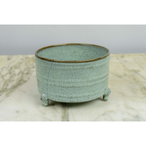 20 - A CHINESE SONG STYLE RU WARE BOWL, in blush green craquelure glaze on tripod legs, 13cm D x 9cm H.