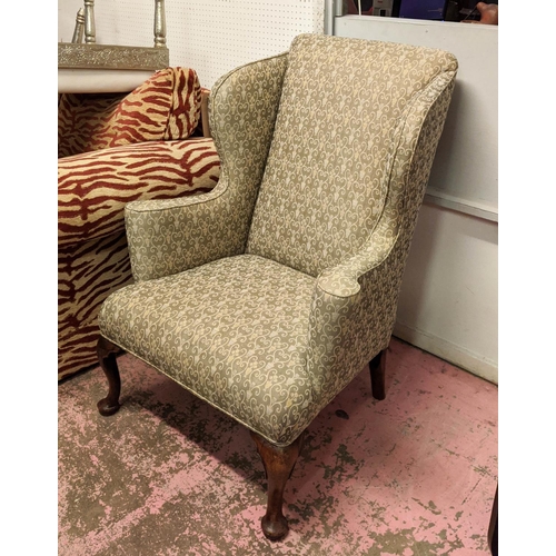 124 - WINGBACK ARMCHAIR, 78cm W x 104cm H.