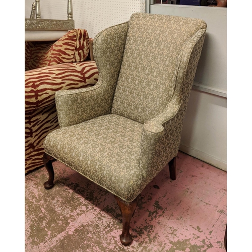 124 - WINGBACK ARMCHAIR, 78cm W x 104cm H.