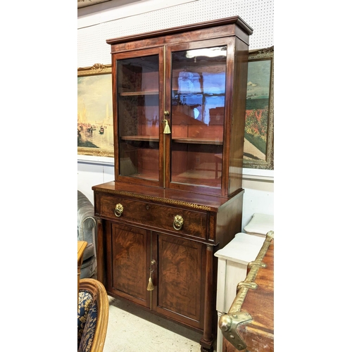 128 - SECRETAIRE BOOKCASE, 195cm H x 94cm W x 47cm D, Regency mahogany and brass inlaid with two glazed do... 