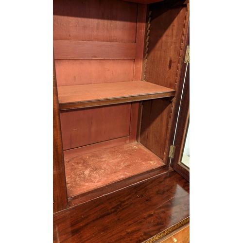 128 - SECRETAIRE BOOKCASE, 195cm H x 94cm W x 47cm D, Regency mahogany and brass inlaid with two glazed do... 