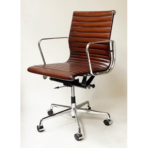 117 - REVOLVING DESK CHAIR, Charles and Ray Eames inspired with ribbed tan leather seat revolving and recl... 