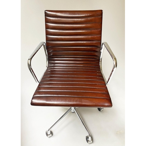 117 - REVOLVING DESK CHAIR, Charles and Ray Eames inspired with ribbed tan leather seat revolving and recl... 