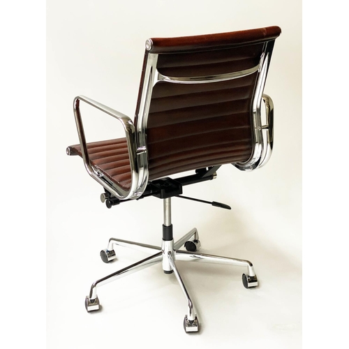 117 - REVOLVING DESK CHAIR, Charles and Ray Eames inspired with ribbed tan leather seat revolving and recl... 