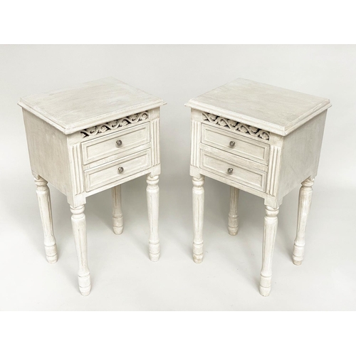 112 - BEDSIDE CHESTS/TABLES, a pair, French style traditionally grey painted each with pierced frieze and ... 