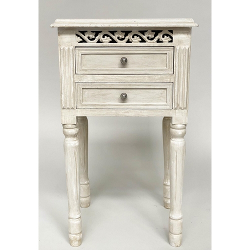 112 - BEDSIDE CHESTS/TABLES, a pair, French style traditionally grey painted each with pierced frieze and ... 