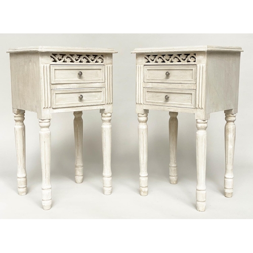 112 - BEDSIDE CHESTS/TABLES, a pair, French style traditionally grey painted each with pierced frieze and ... 