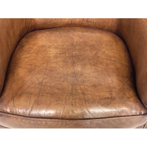 115 - PROFESSOR STYLE TUB ARMCHAIR, buttoned aged brass studded tan leather with rounded back and arms, 80... 