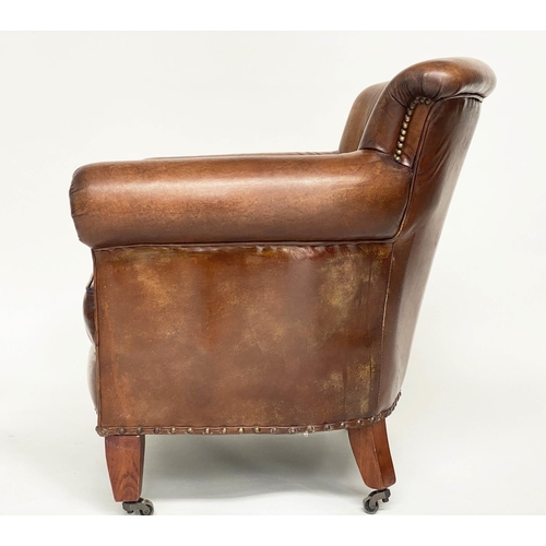 115 - PROFESSOR STYLE TUB ARMCHAIR, buttoned aged brass studded tan leather with rounded back and arms, 80... 