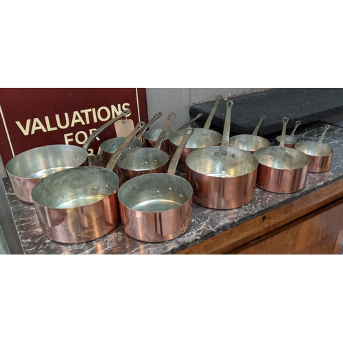 146 - BATTERIE DE CUISINE, comprising twelve copper pans. (12)