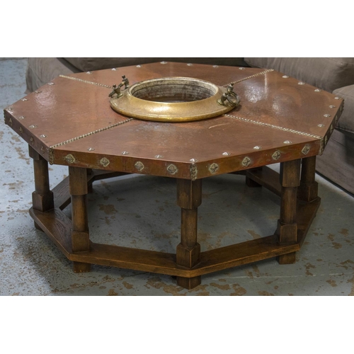 135 - ARABIAN FIRE PIT TABLE, 50cm H x 105cm, oak, copper and brass with studded octagonal top.