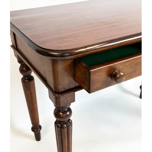 131 - WRITING TABLE, 70cm H x 91cm x 47cm, Victorian mahogany with two drawers on reeded front legs.