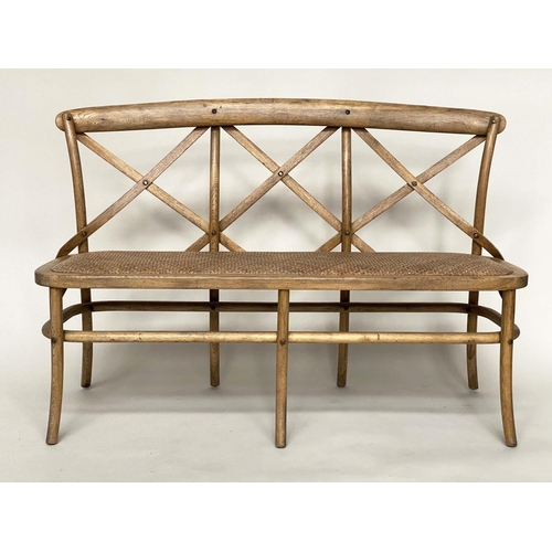 183 - OKA HALL BENCH, bentwood framed with 'X' back and woven cane seat, 135cm W.