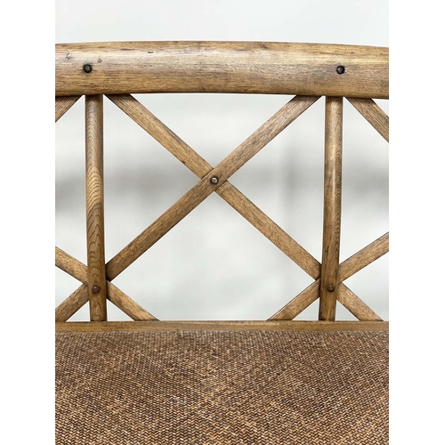 183 - OKA HALL BENCH, bentwood framed with 'X' back and woven cane seat, 135cm W.