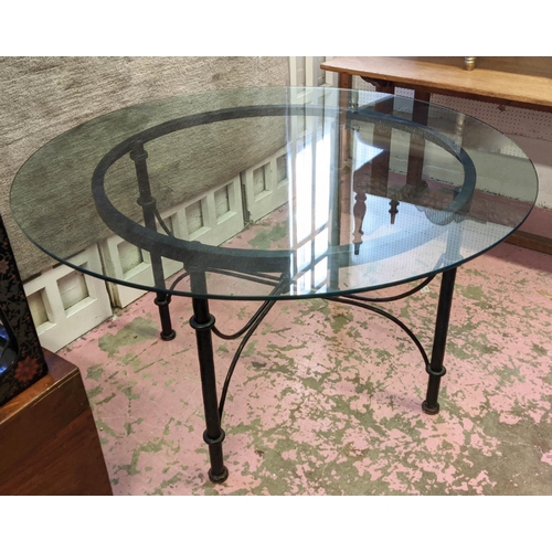 169 - DINING TABLE, 101cm W x 74cm H, the circular glass top on a metal base.