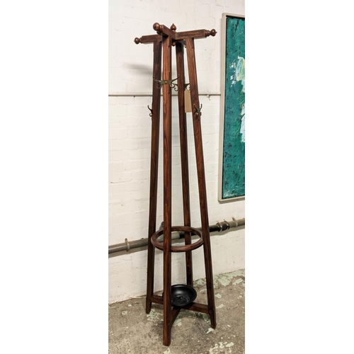 176 - COAT STAND, 191cm H, Country House style with sixteen hooks, four hat hooks and central umbrella hol... 