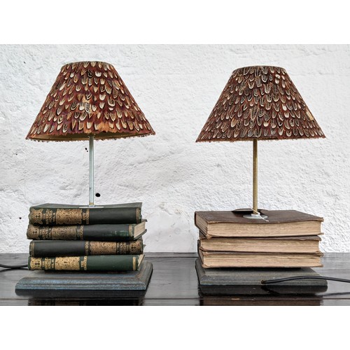 328 - TABLE LAMPS, a pair, 42cm H, made from vintage novels, with pheasant feather shades. (2)