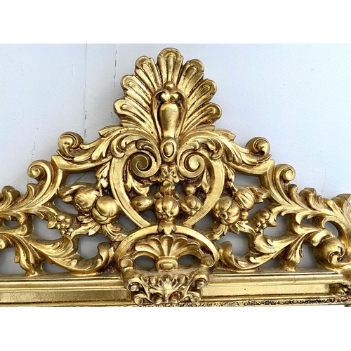 417 - WALL MIRROR, 125cm high, 67cm wide, Baroque style, gilt frame, bevelled edge glass, shell moulded fi... 